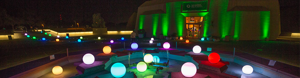 The Hall Plaza lit up at a prior Benefit event