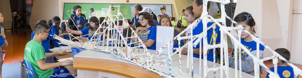 Happy students building a Bay Bridge modal